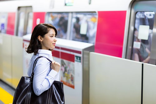 Woman waiting for subway